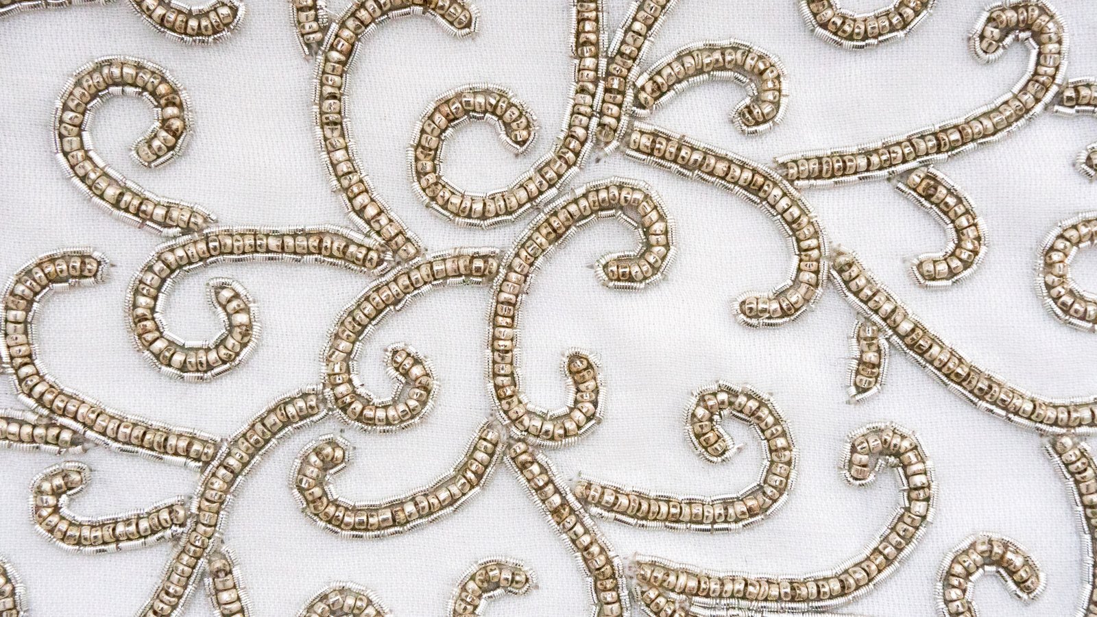 Close-up of the hand embroidery on the Chessed atarah