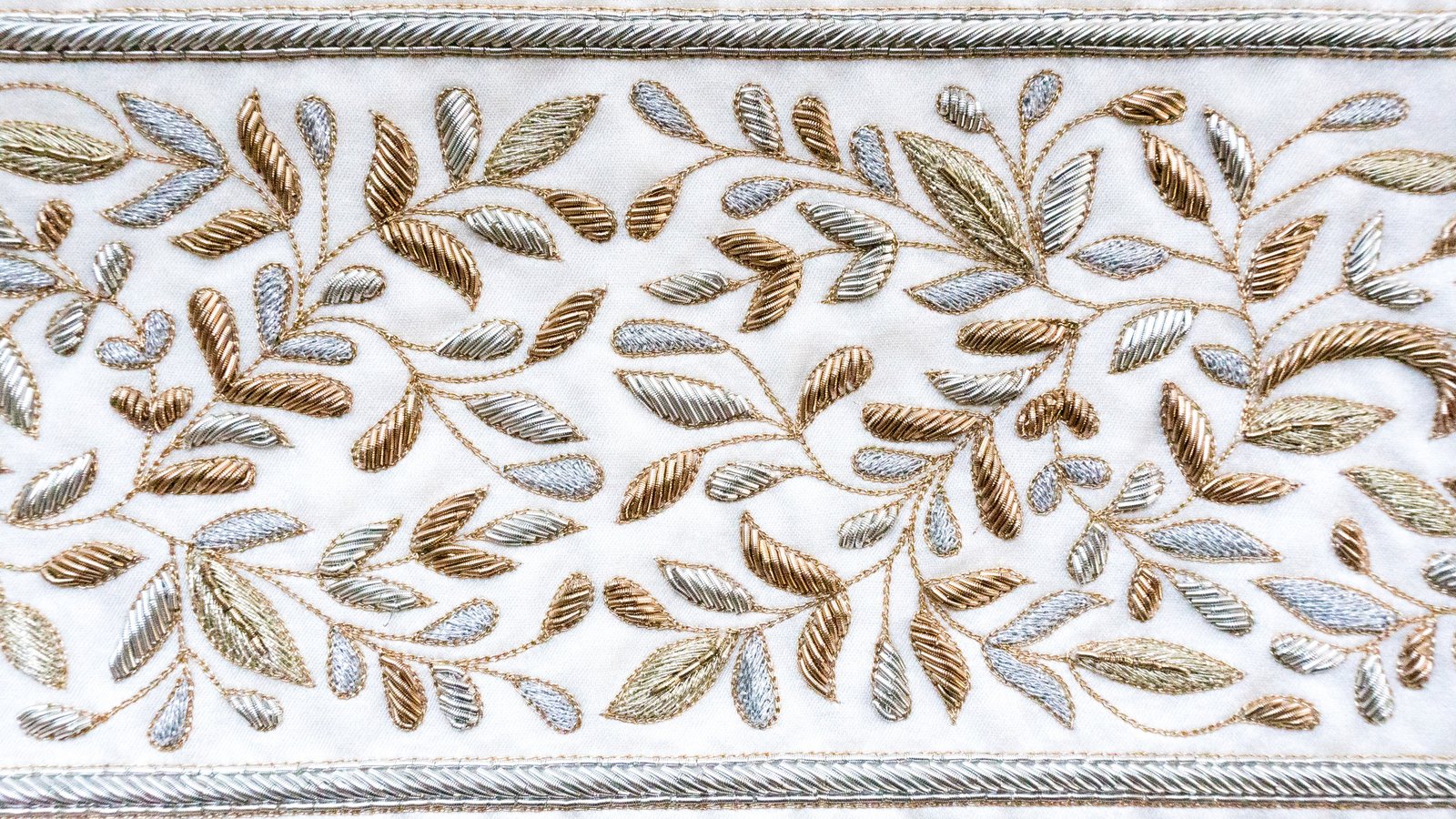 Close-up of the hand embroidery on the Malhut atarah