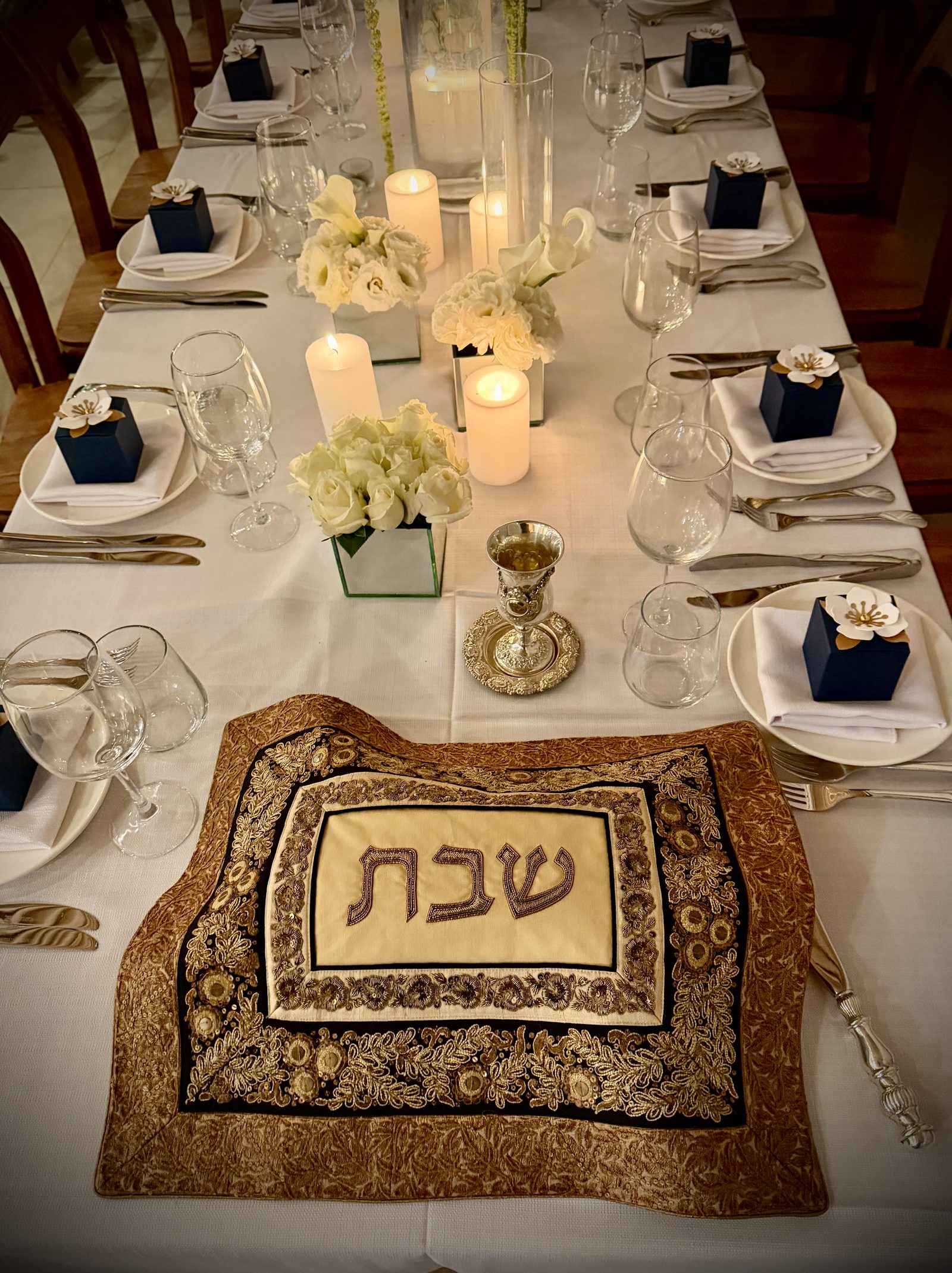 Styled Shabbat table with Malqeta challah cover